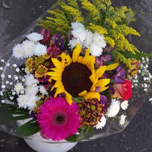 Placement of flowers on the grave